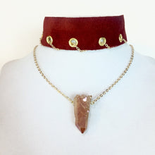 Lylia crystal pendant.